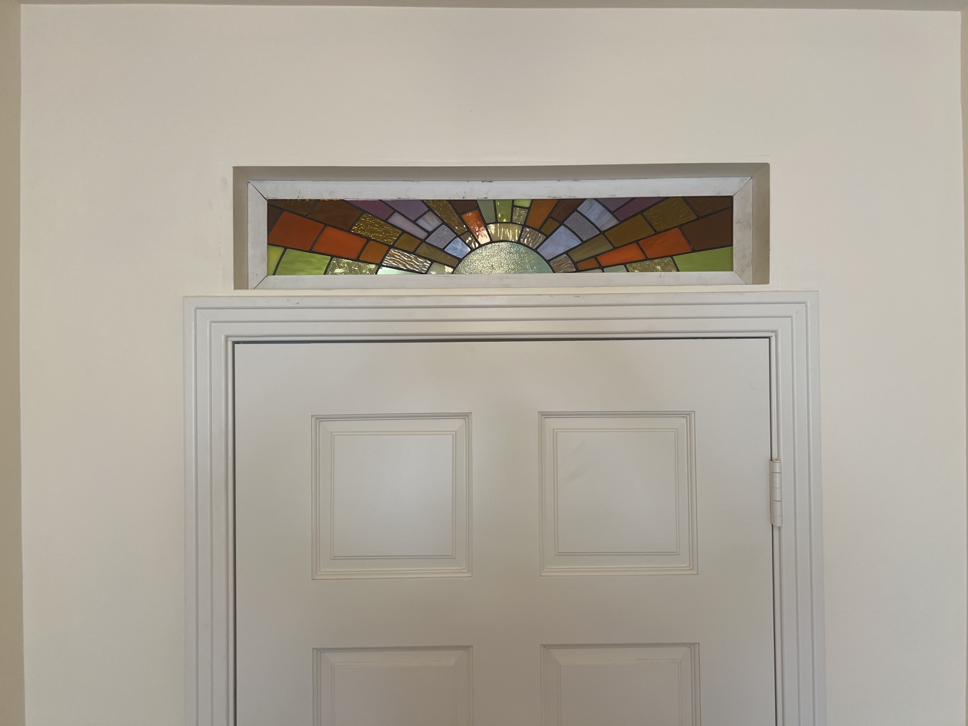 Kate & Tony custom transom window